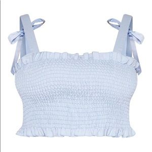 Elegant crop top with adjustable tying sleeves!